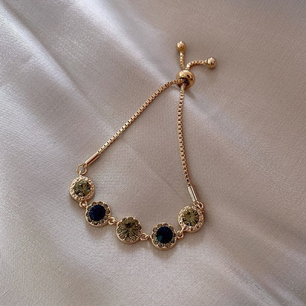 Zielona bransoletka z kryształami w złocie