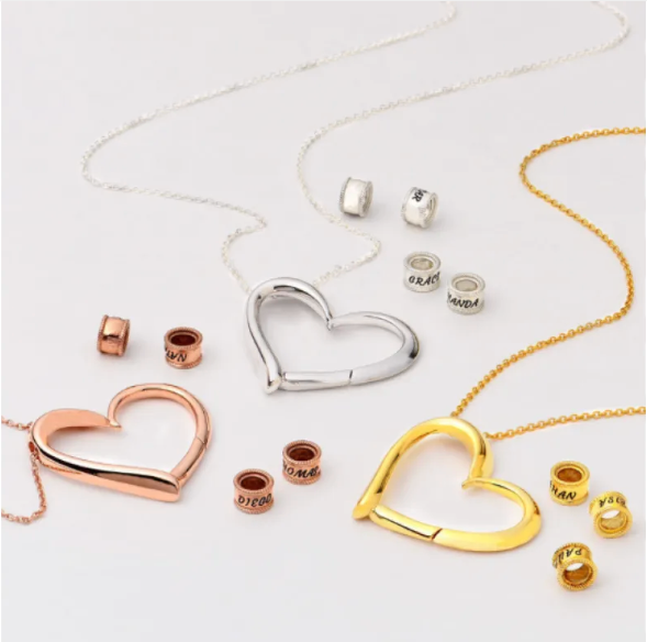Spersonalizowany naszyjnik z sercem z możliwością mocowania pierścieni i grawerowania dowolnej nazwy