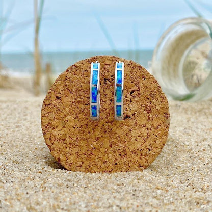 Srebrne kolczyki z niebieskim oceanicznym opalem