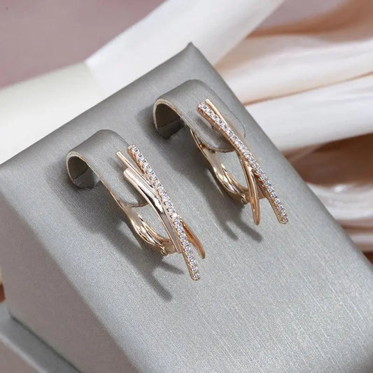 Wspaniałe złote kolczyki w kształcie krzyża Brilliant Cross