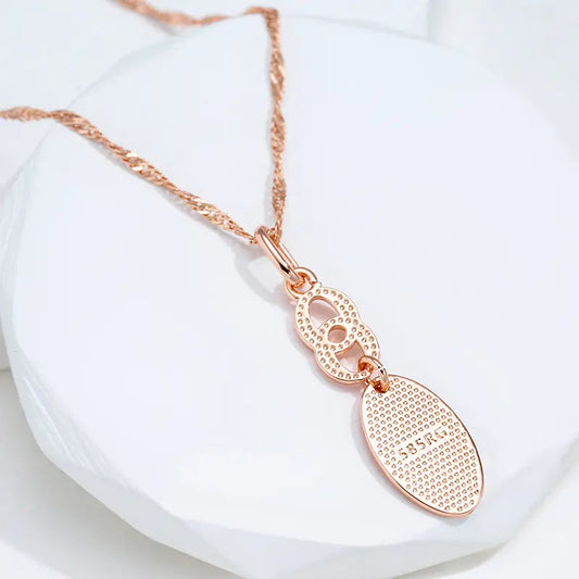 Pozłacany naszyjnik z błyszczącym zakończeniem