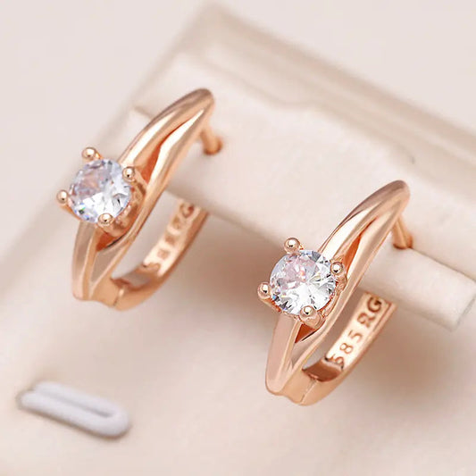 Złote kolczyki z kryształami